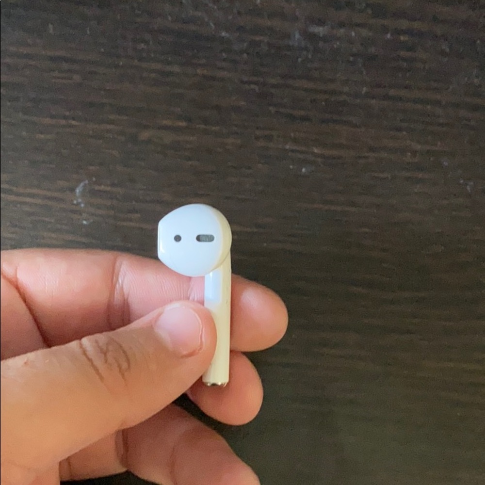 One AirPod right ear